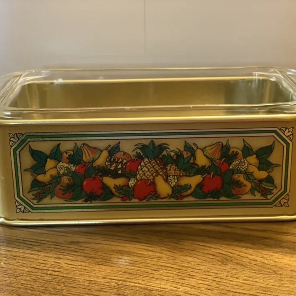 #30 Pyrex baking dish with brass holder painted with a flower motif Very Retro